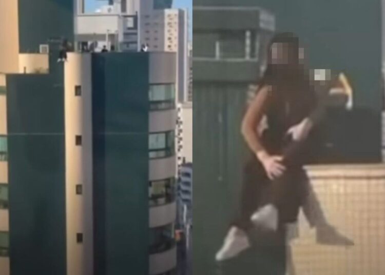 Jovem é flagrada sentada em terraço de prédio e assusta vizinhos em Balneário Camboriú